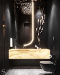 The second guest bathroom, with vanity units made of onyx. We prefer matte black surfaces