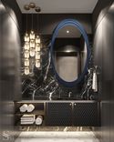The third guest bathroom, featuring a mirror and vanity unit crafted with a custom design