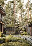The facade of the house is made of thermally treated wood, ceramic granite, and metal.